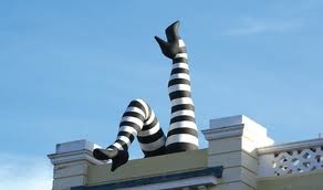 The famous legs above the Duke of Yorks' Picturehouse, Brighton; click to visit the web site in a new window